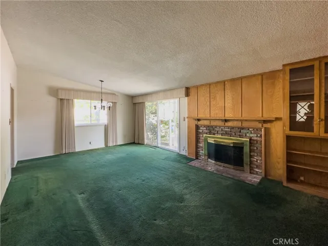 Living Room and Dining Area with Fireplace