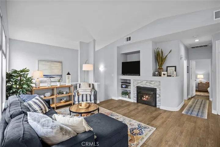Cozy Living Room with fireplace and built-ins. (Fireplace digitally added)