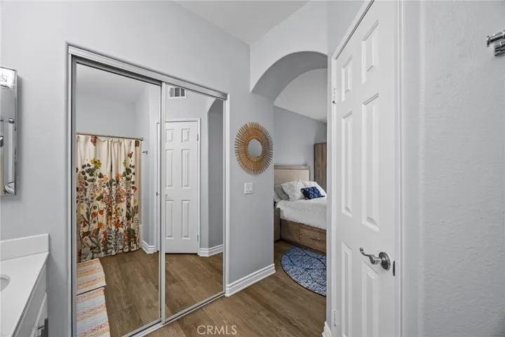 Walk in closet in primary bathroom