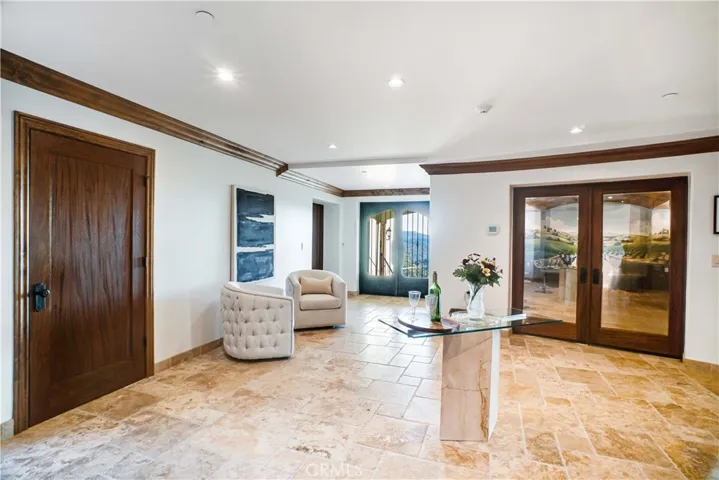 Reception area outside wine cellar and home theater