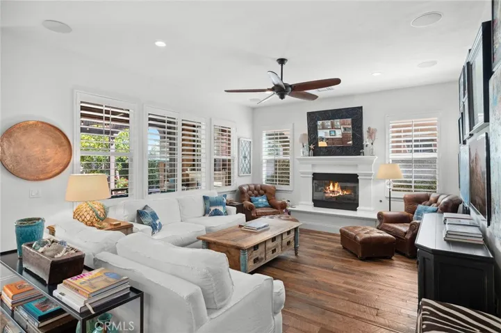 Note the barn wood floors and plantation shutters
