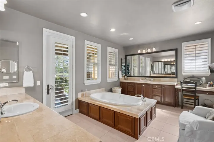 Jetted soaking tub is the focal point of the room