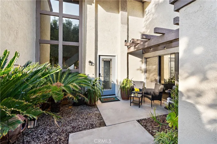 The spacious front patio with an inviting and relaxing ambiance.