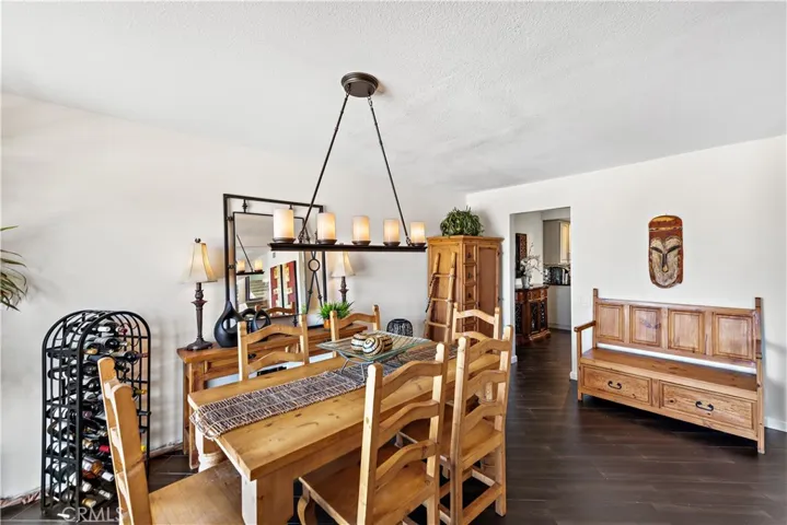 The dining room flows seamlessly from the living room. Boasting plenty of space for all your decorating needs.