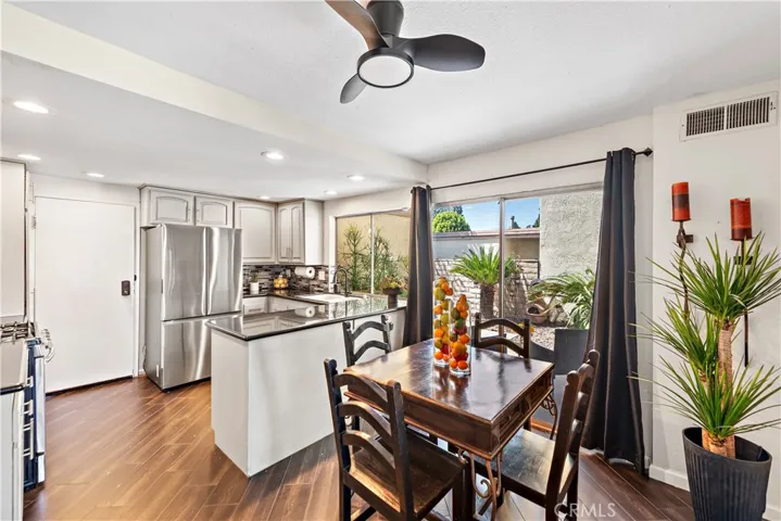 The lovely kitchen offers what every cook is looking for and more!  Plenty of counter and cabinet space. Remodeled with gorgeous cabinetry and stainless appliances.