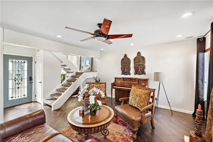 Another angle of the spacious living room.  Notice the beautiful front door which lets in additional light.