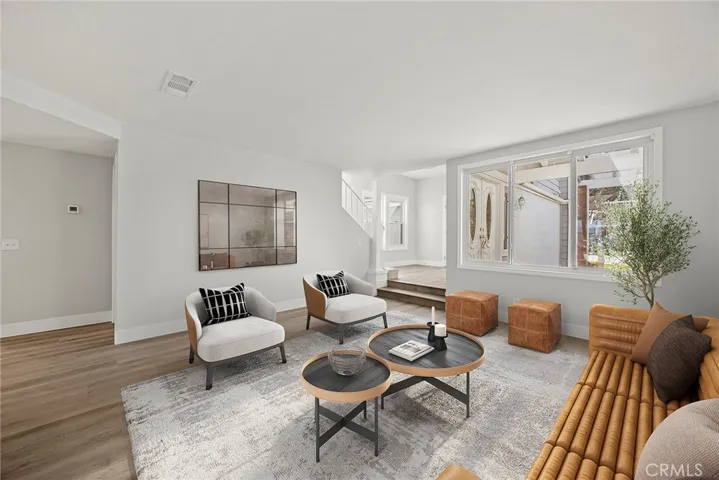 FORMAL LIVING ROOM LOOKING TOWARDS ENTRY.