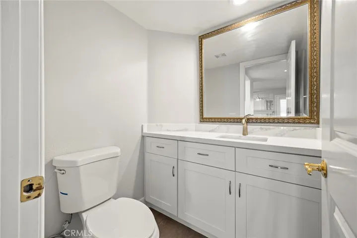 DOWNSTAIRS REMODELED HALF BATH.