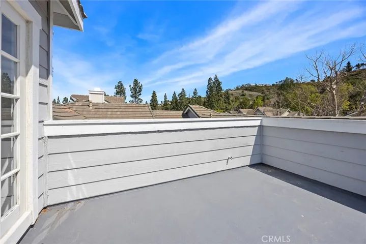 UPSTAIRS BALCONY WITH VIEW OF HILLS.