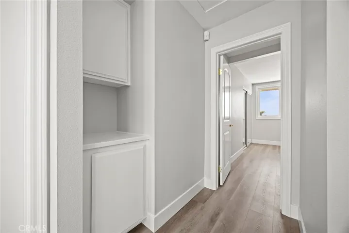 UPSTAIRS HALL WITH LINEN CLOSET.