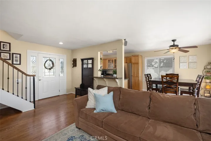 Note the beautiful front door & upgraded stair railing.