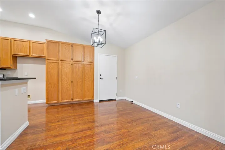 The dining area flows seamlessly between the kitchen and family room and offers direct garage access.