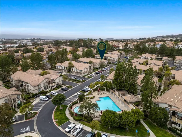 Surrounded by scenic hills and lush greenery.