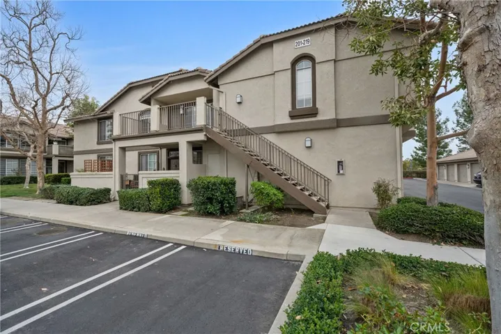 Welcome to 219 Chaumont Lane, an upper-level end-unit condo in the highly sought-after Salerno community.

