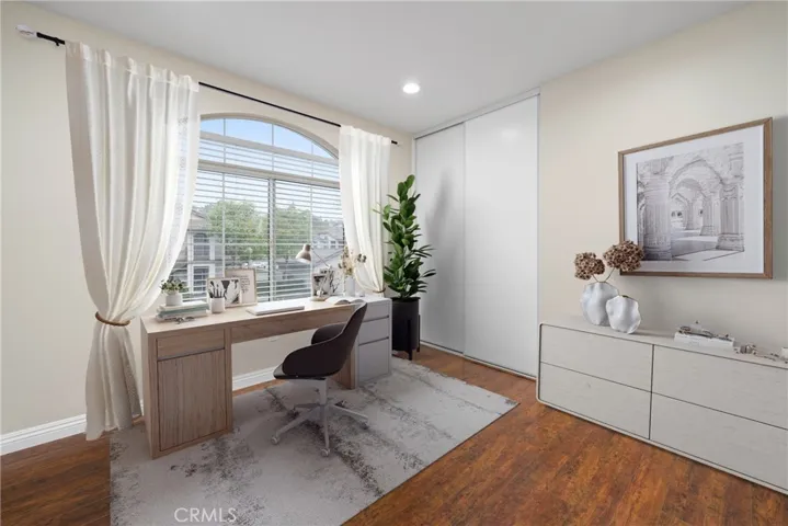 Secondary bedroom virtually staged as an office!