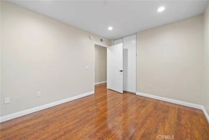 Well-lit rooms with laminate flooring and stylish finishes throughout.