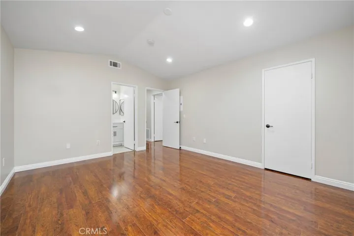 The owner’s suite offers privacy, space, and modern updates.