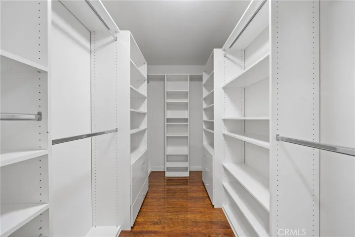 The primary bedroom is a true retreat with a walk-in closet and an upgraded ensuite bath.