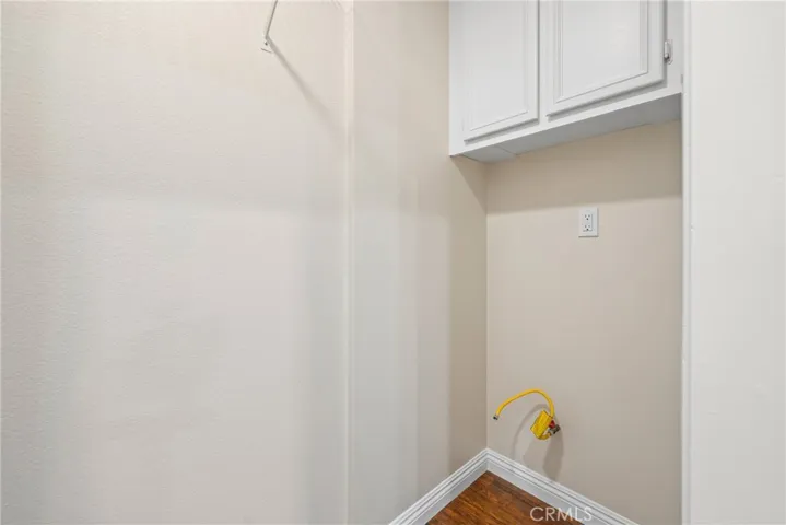 Conveniently located laundry closet with washer and dryer hookups.
