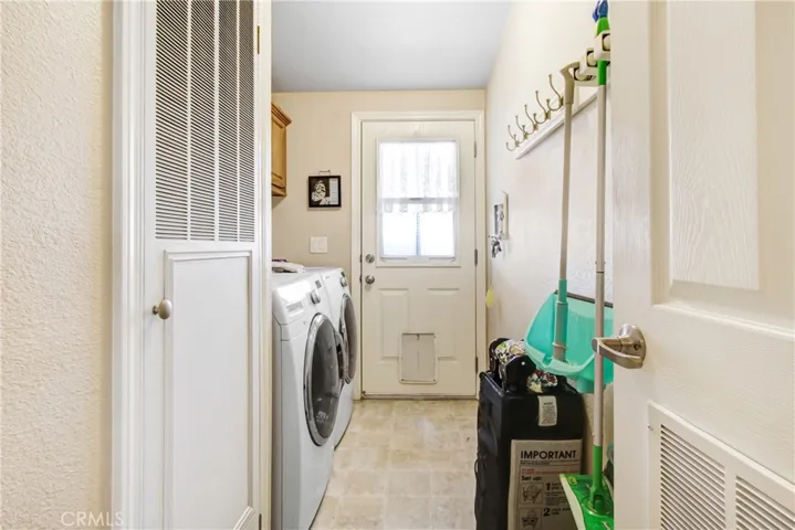 Laundry Room with Exit out to Carport