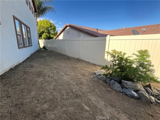 Large side yard to expand outdoor living or potential RV parking