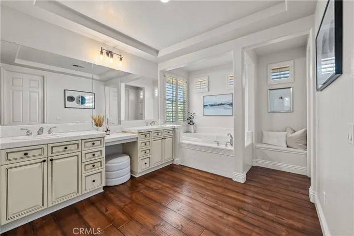 Spa-like Ensuite with Luxe Wood Floors and Jetted Tub