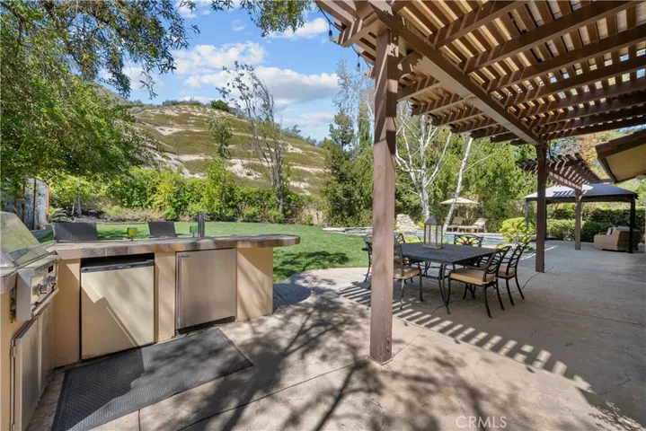 Large BBQ Island has Refrigerator and Kegerator