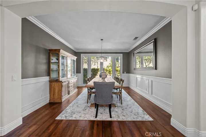 Custom French Doors were added to open the entertaining space to additional private courtyard