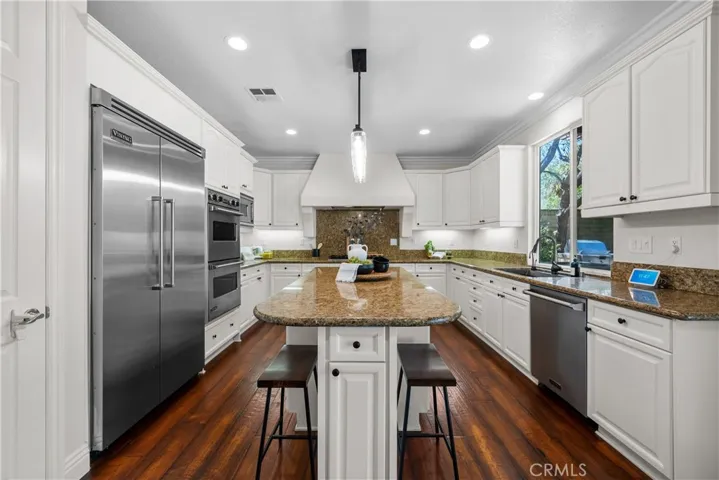 Spacious Gourmet Chef's Kitchen is the Heart of the Home Complete with Island Seating
