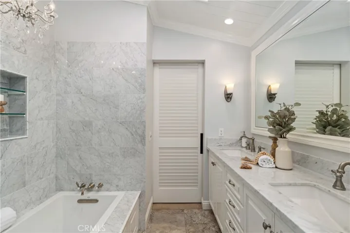 Barn door closes the primary bathroom from lights in the morning!
