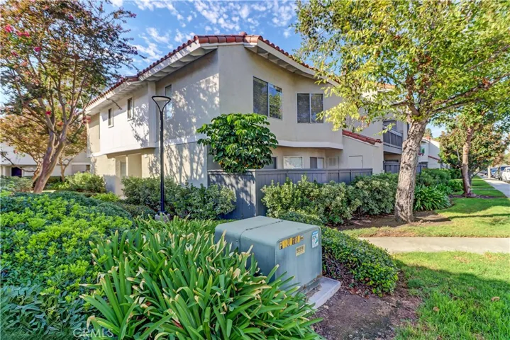 Front entrance by sidewalk near unit