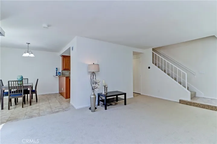 Portion of living room and dining area