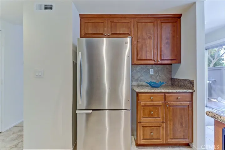 Refrigerator in kitchen- can stay or be removed