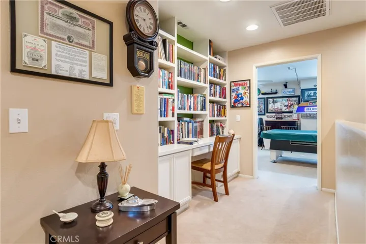 Hallway to Gameroom with Built-Ins