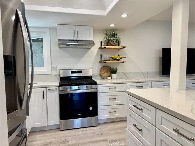 New Kitchen - Quartz Counters - Real Butcher block shelving - Beautiful Island
