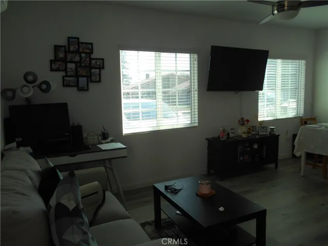 Living area features two large dual pane windows