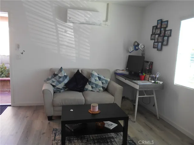 living area with remote for cool and warm air