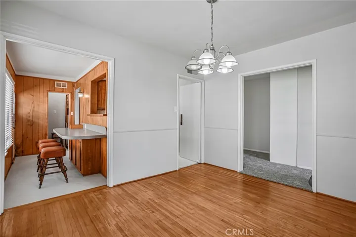 Dining room with breakfast bar in kitchen