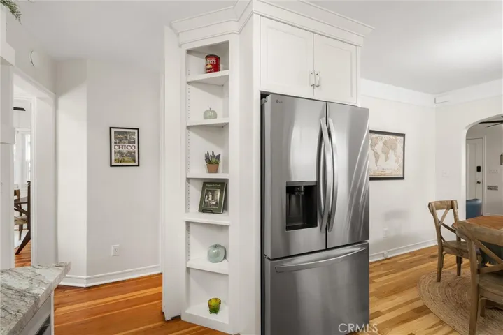 Kitchen corner shelf, opening on left leads to bathroom, laundry room and office