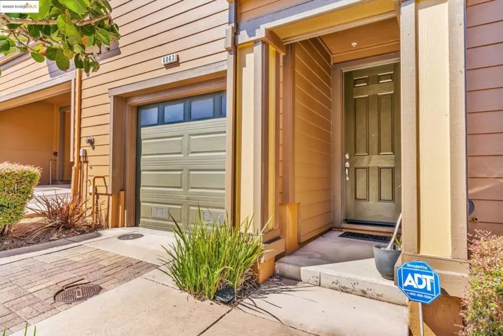 Entrance to property featuring a garage