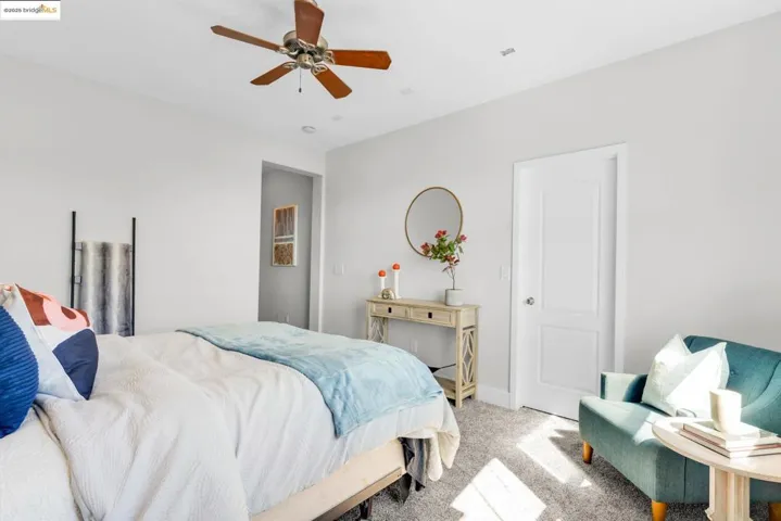 Bedroom featuring carpet and a ceiling fan
