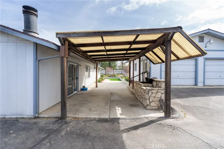 Patio and barbique area behind the house.