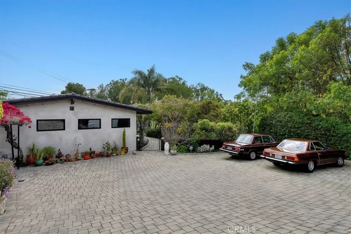 Driveway so spacious could park your vintage cars collection!