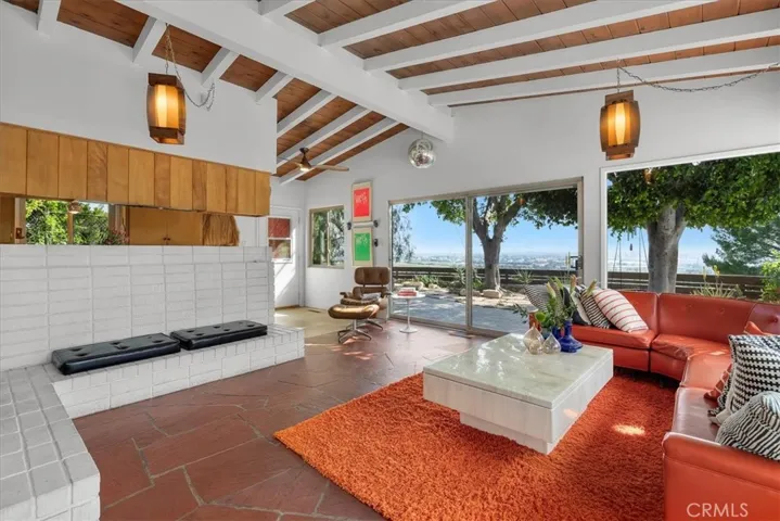 Welcome to this peaceful mid-century modern home with sweeping harbor, mountain and city views