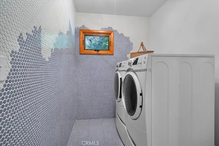 Laundry room with designer touches