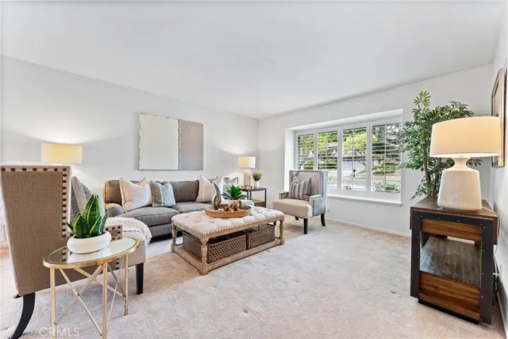 Large living room overlooking the front yard.