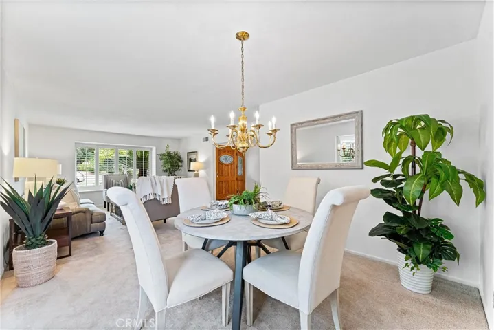 This view is from the dining room, overlooking the living room and a quick took to the front door