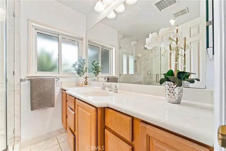 Also at the end of the hallway is this 3/4 bath. The shower was recently updated.