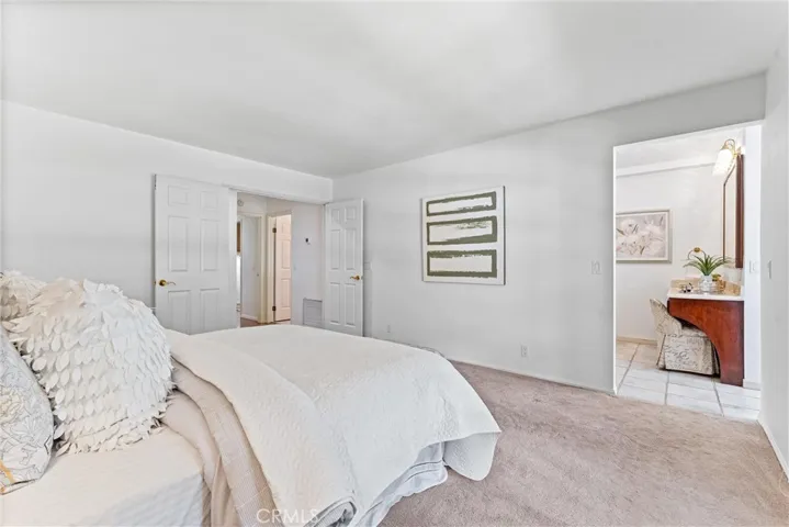 The primary bedroom has double entry doors.  Then step into the spacious bathroom suite
