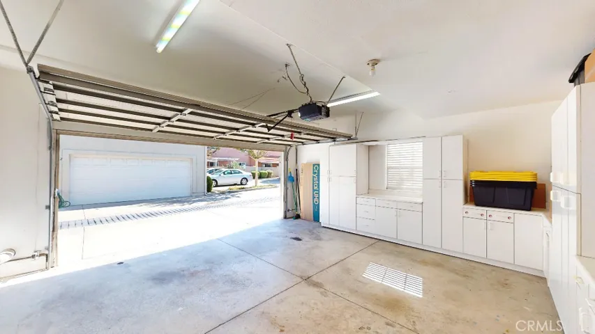 2 Cars Garage with built in storage and cabinets